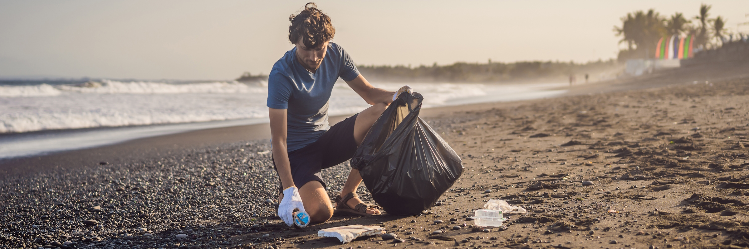 Young,Man,Cleaning,Up,The,Beach.,Natural,Education,Of,Children